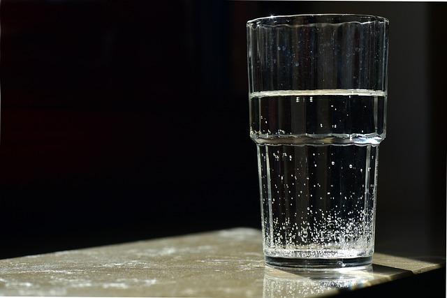 Crystal clear glass of water symbolizing improved safety through rapid PFAS detection technology.